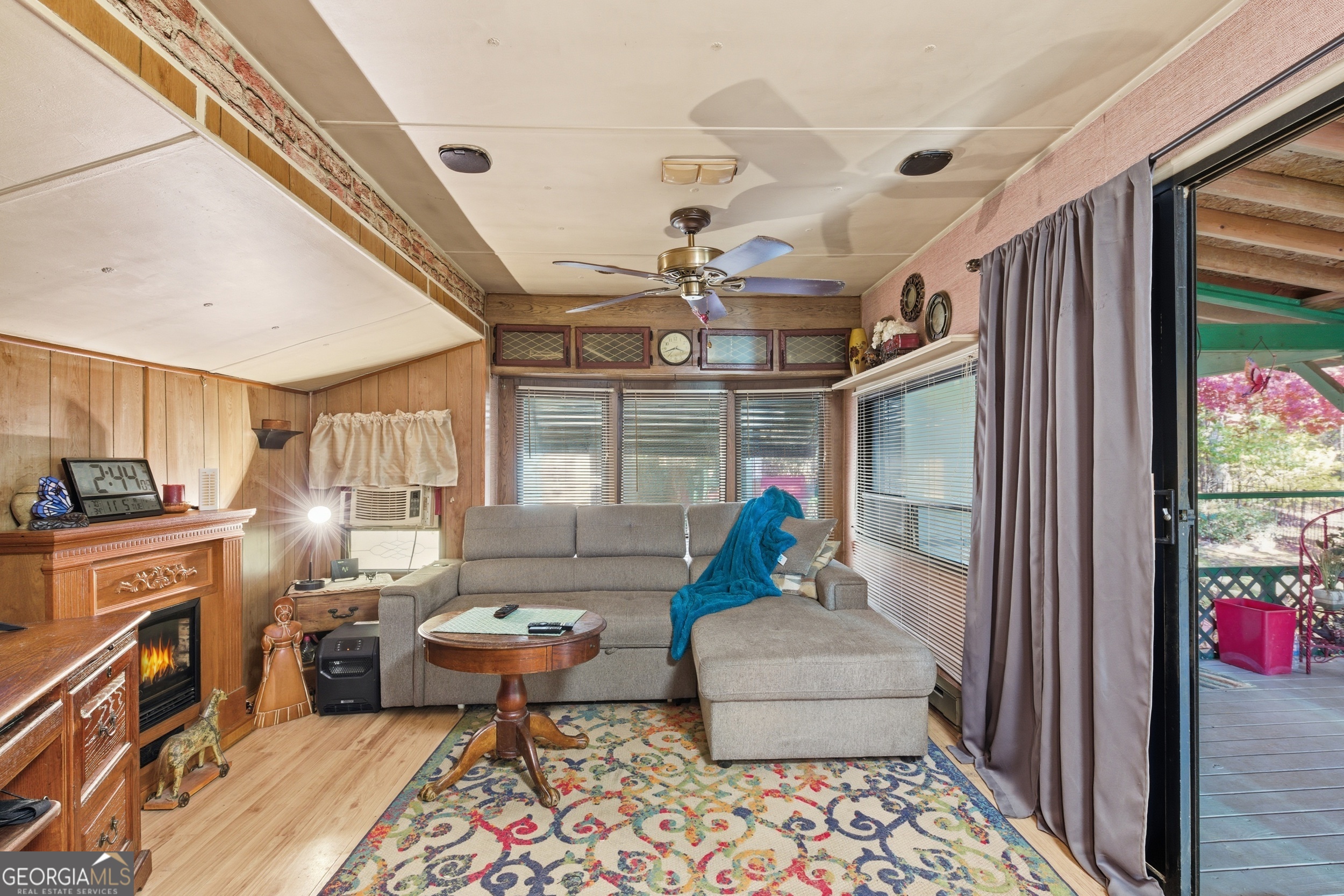 105 Holiday Loop Cleveland, GA 30528 - Photo 5 of 41 a living room with furniture and a fireplace
