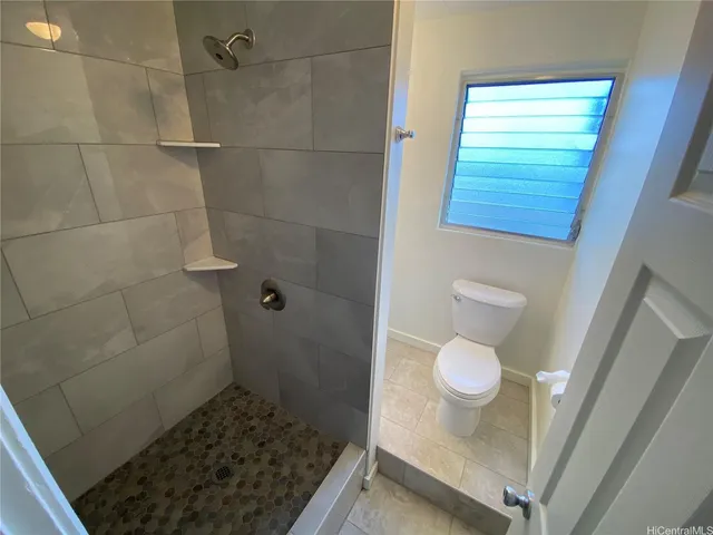 a bathroom with a sink and a shower