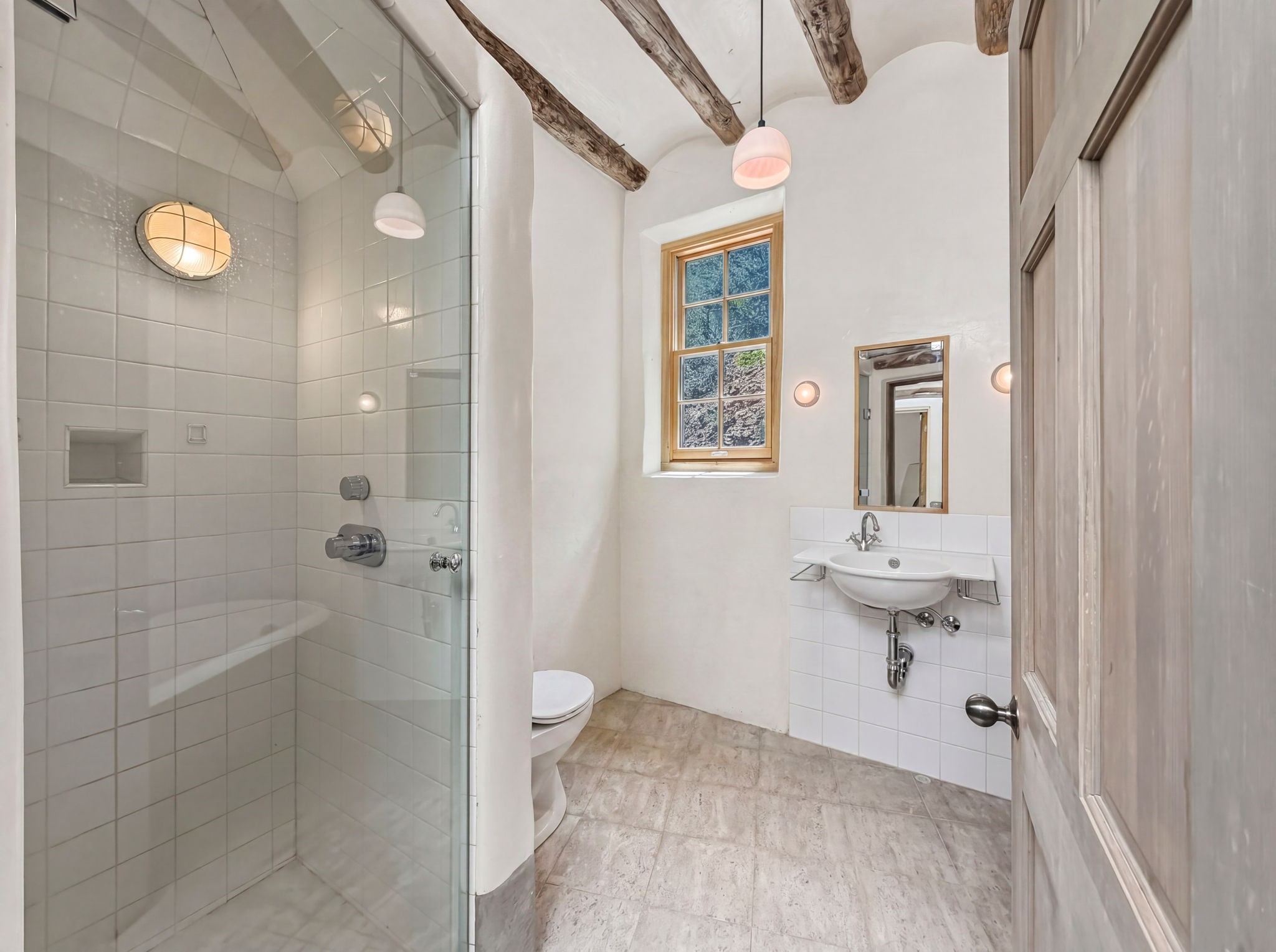 1692 Upper Canyon Road Santa Fe, NM 87501 - Photo 15 of 52 Full Bathroom + Claw-Foot Tub located by the Sunroom and Great Room.