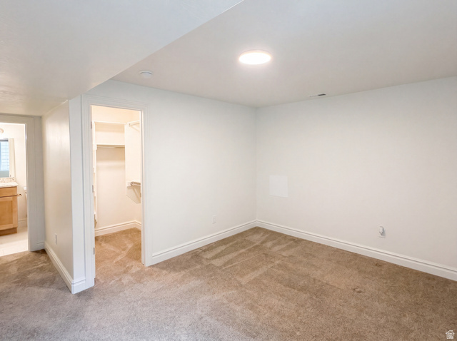 1251 North 2525 West Clinton, UT 84015 - Photo 14 of 30 Room featuring light-toned carpet flooring, white painted walls, and recessed lighting