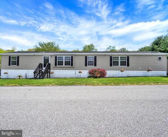 front view of house with a yard
