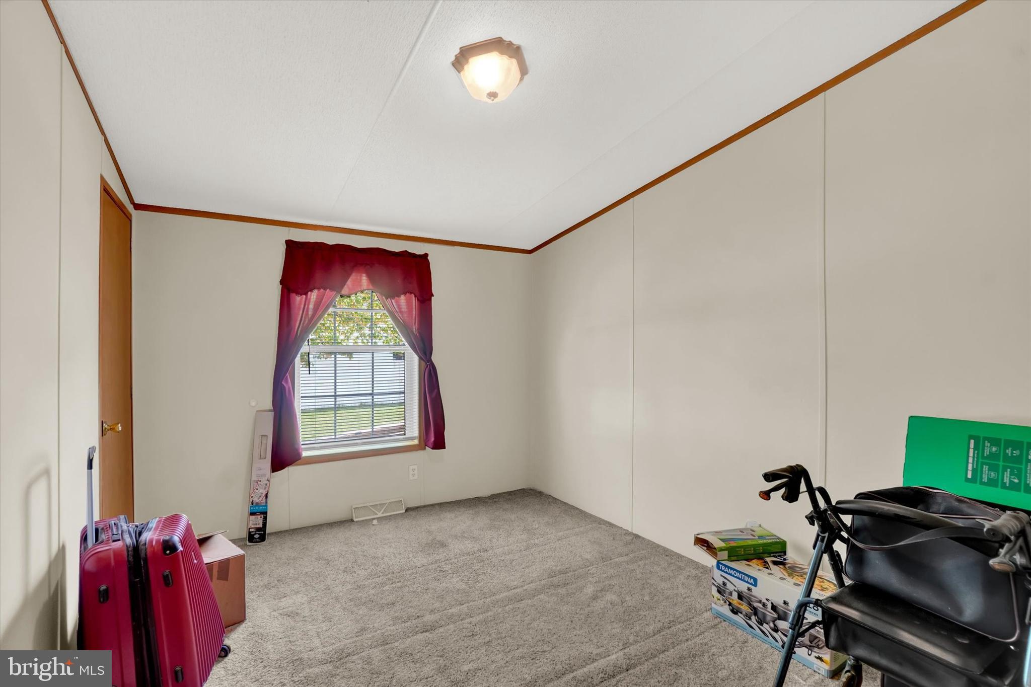 700 Cassel Road, Unit 132 Manchester, PA 17345 - Photo 25 of 26 a view of a room with gym equipment and windows