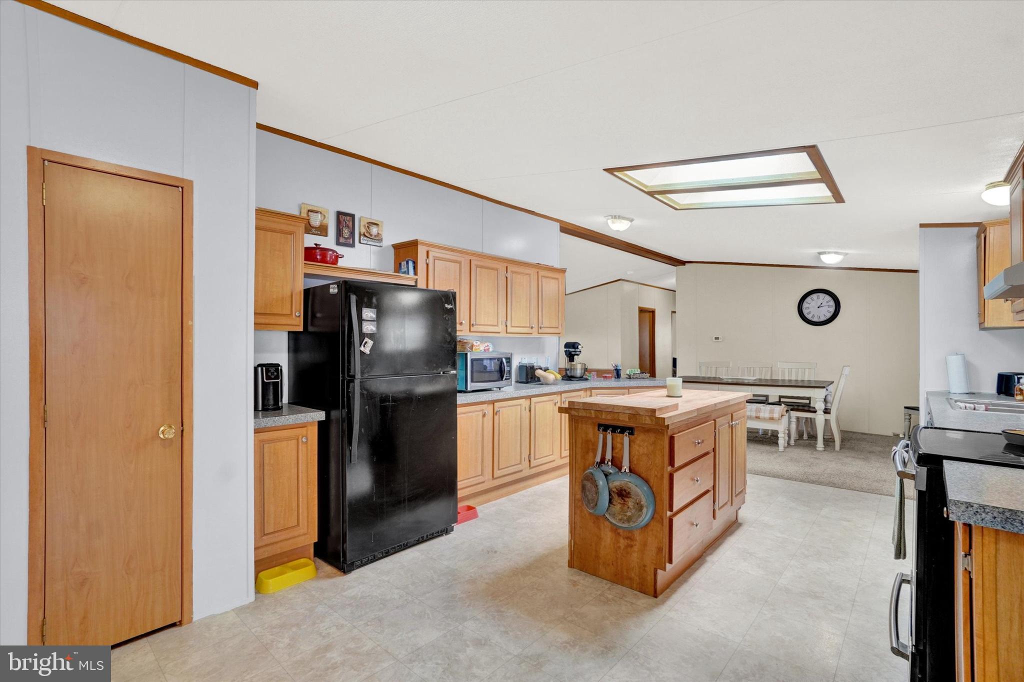 700 Cassel Road, Unit 132 Manchester, PA 17345 - Photo 9 of 26 a kitchen with stainless steel appliances granite countertop a refrigerator a stove and a sink