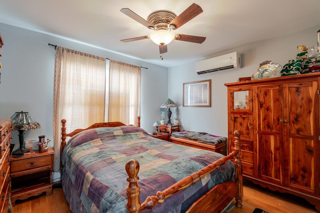 107 Orchard Road Staunton, VA 24401 - Photo 6 of 44 a bedroom with bed and wooden floor