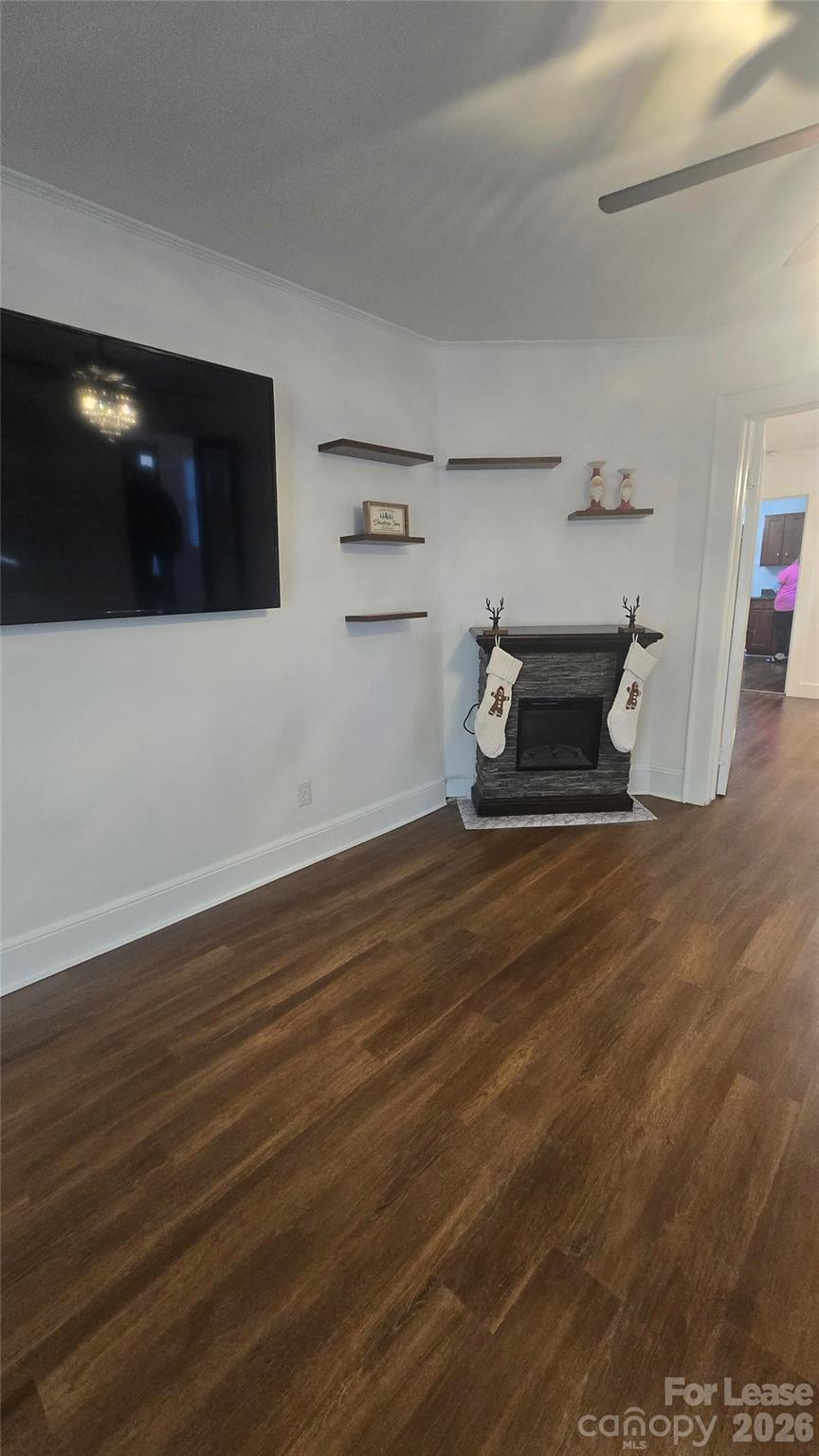 416 Oakland Road Spindale, NC 28160 - Photo 5 of 14 a empty room with wooden floor and windows