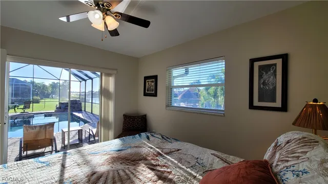 a view of balcony with furniture and umbrella