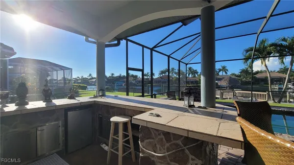 a view of a swimming pool with a patio