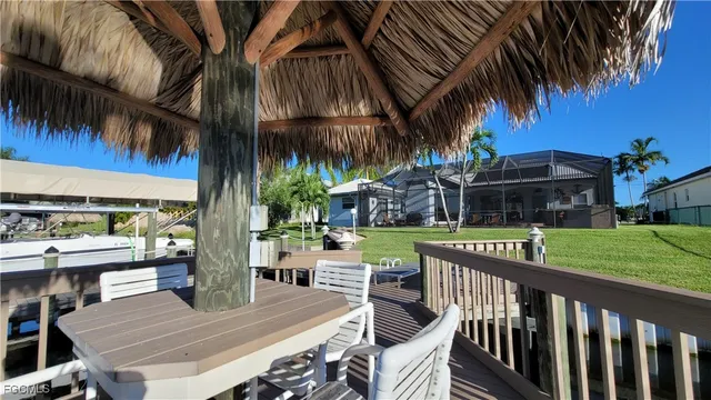swimming pool view with a lake view