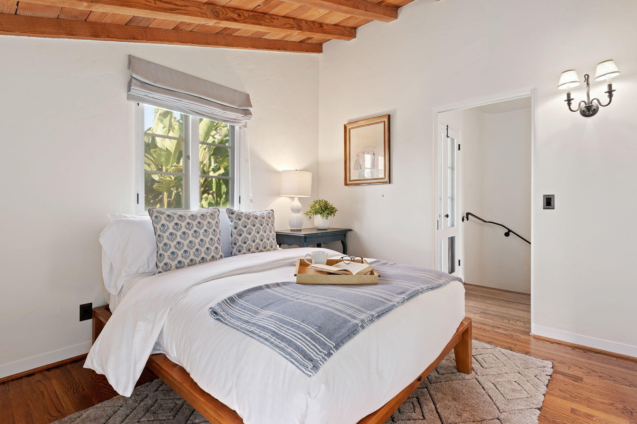 1520 Lingate Lane Montecito, CA 93108 - Photo 23 of 38 a bedroom with a bed and wooden floor