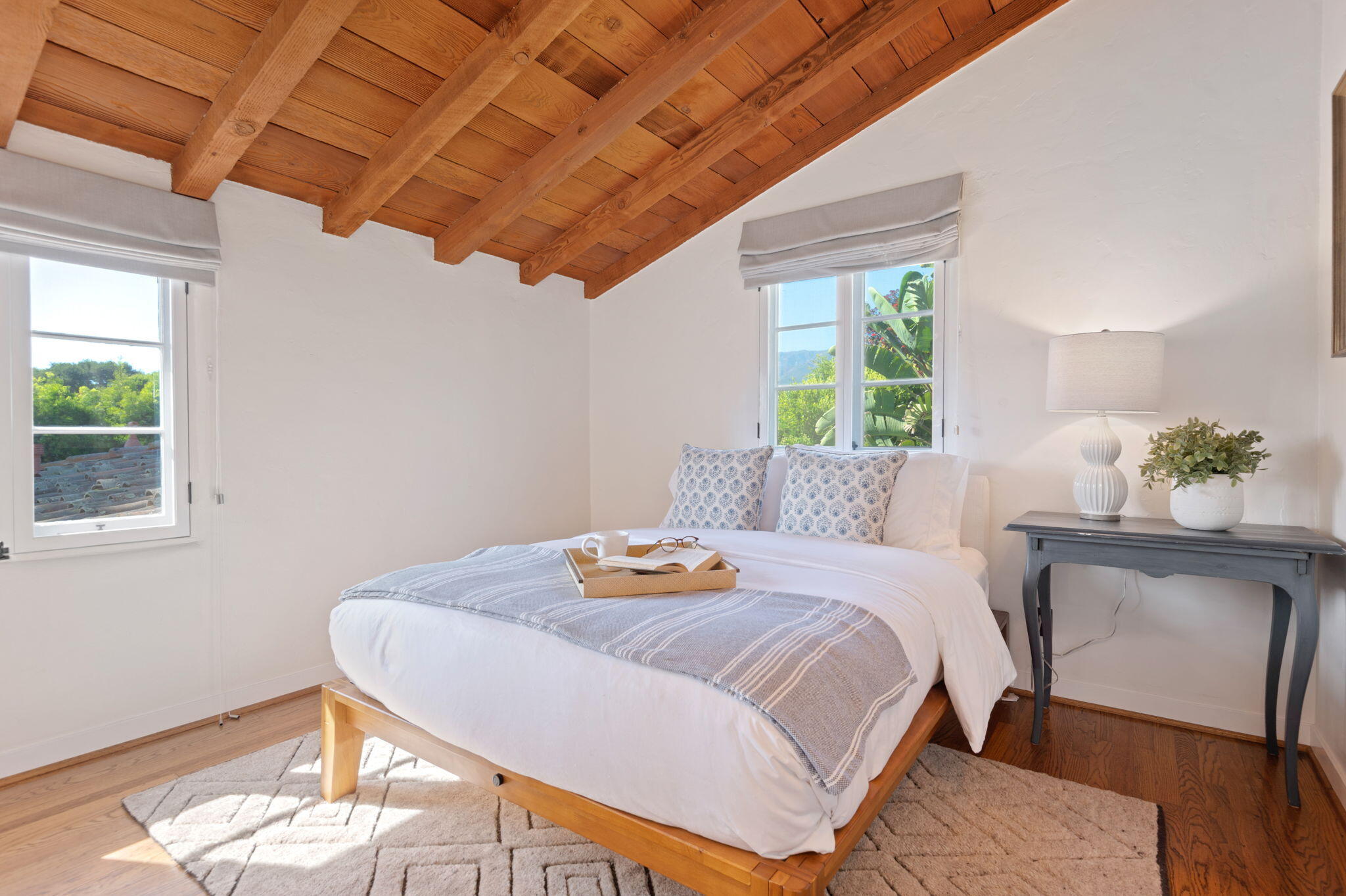 1520 Lingate Lane Montecito, CA 93108 - Photo 24 of 38 a bedroom with a bed and a table