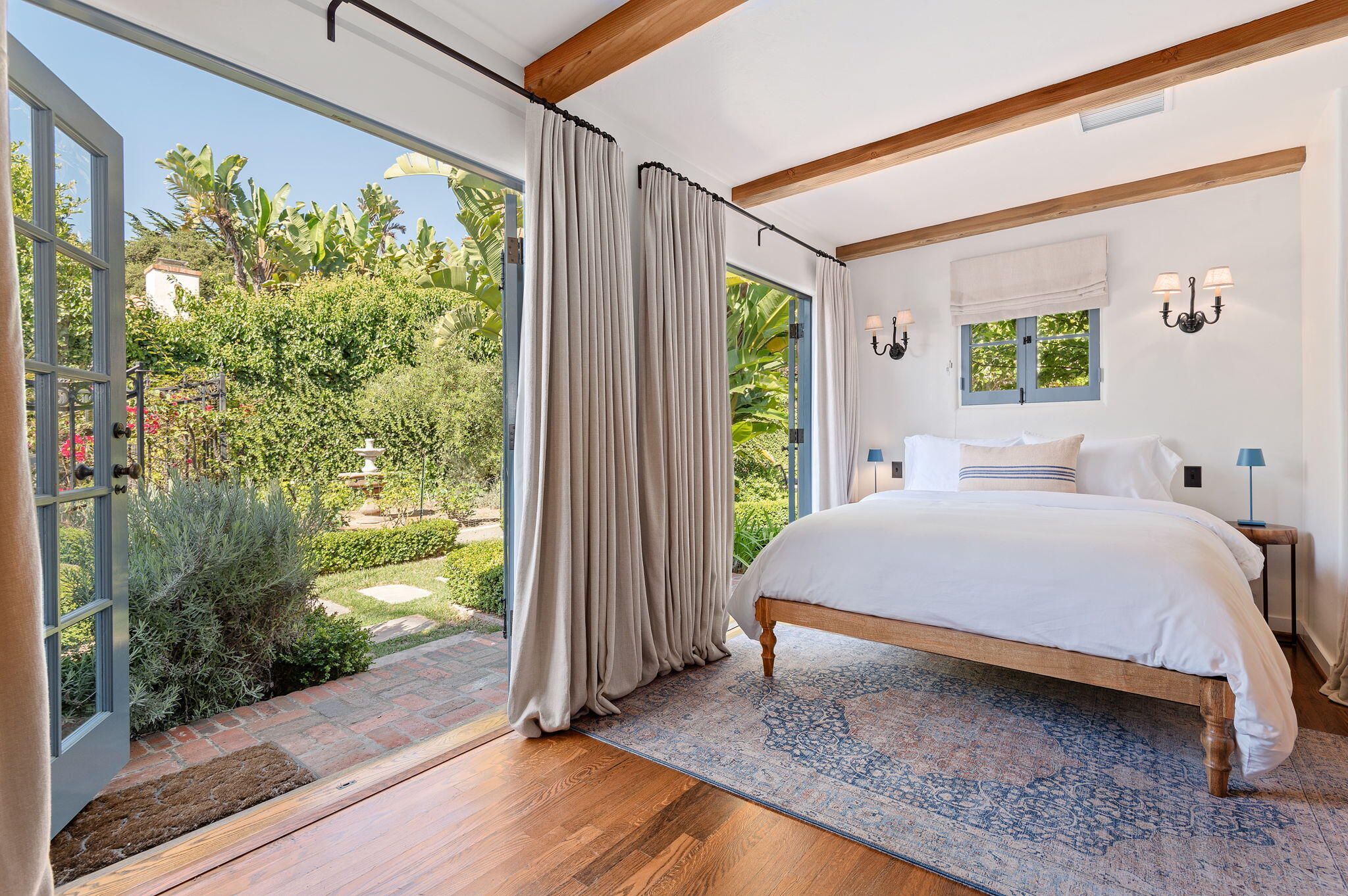 1520 Lingate Lane Montecito, CA 93108 - Photo 25 of 38 a bedroom with a bed and a window