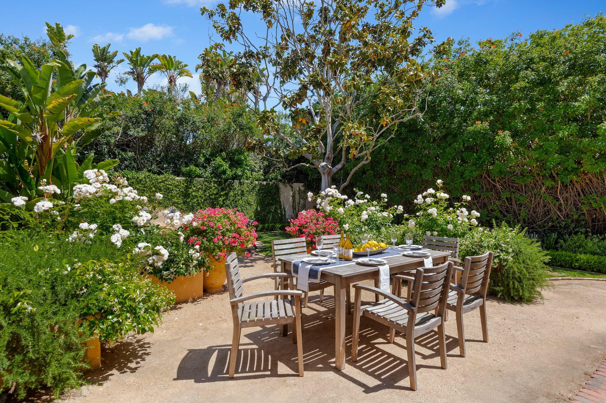 1520 Lingate Lane Montecito, CA 93108 - Photo 27 of 38 a view of a chairs and table in a backyard