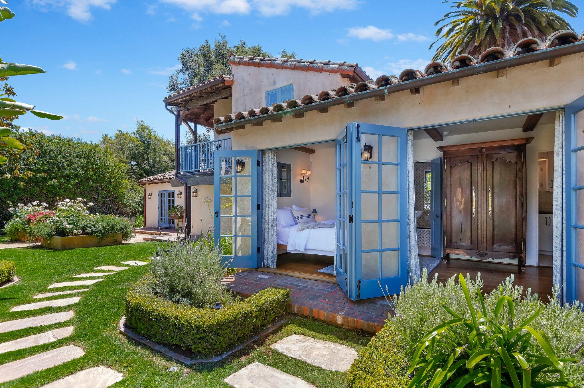 1520 Lingate Lane Montecito, CA 93108 - Photo 7 of 38 a front view of a house with a garden