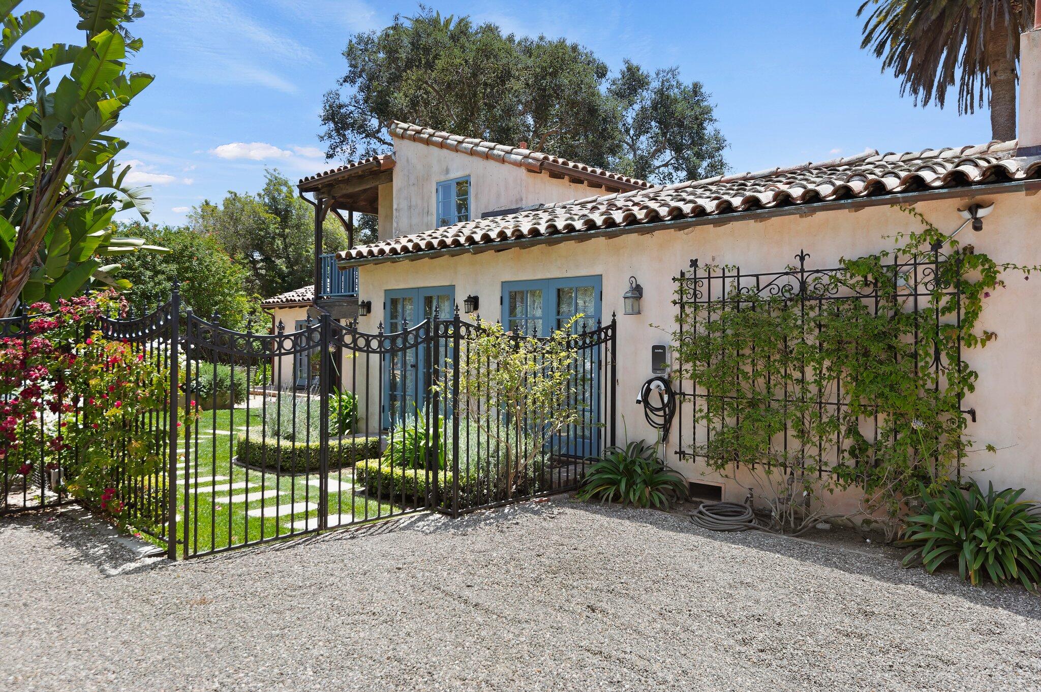 1520 Lingate Lane Montecito, CA 93108 - Photo 8 of 38 a front view of a house with a garden
