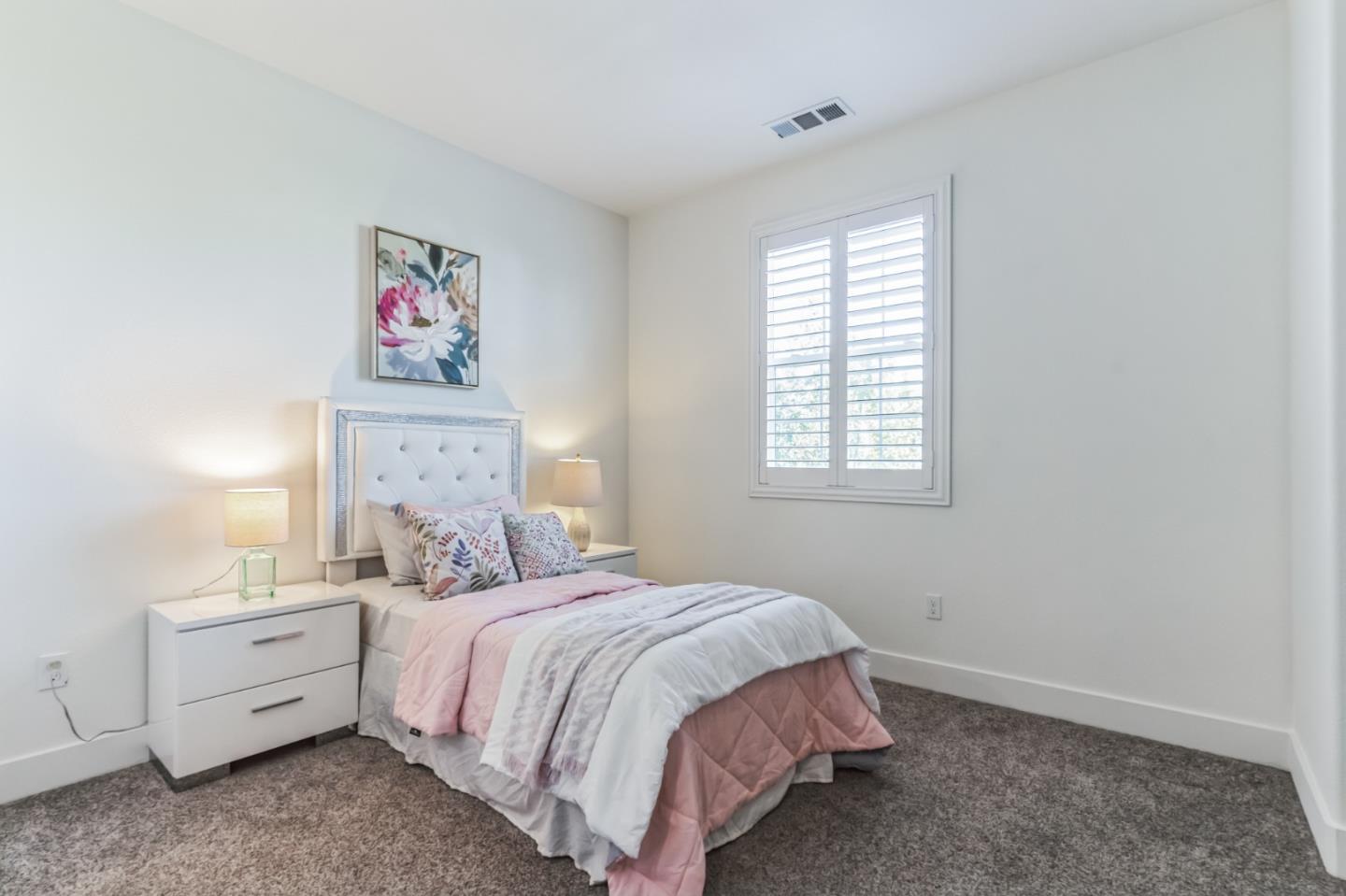 37540 Breakers Road Newark, CA 94560 - Photo 12 of 22 a bedroom with a bed and a window