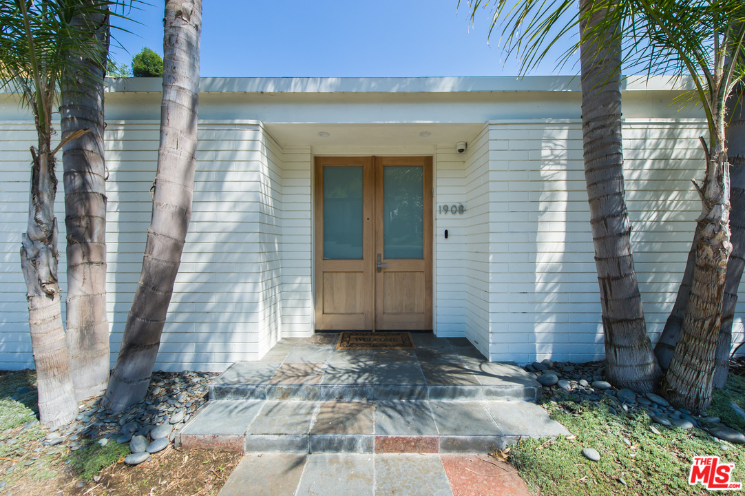 1908 North Beverly Drive Beverly Hills, CA 90210 - Photo 1 of 32 a front view of a house