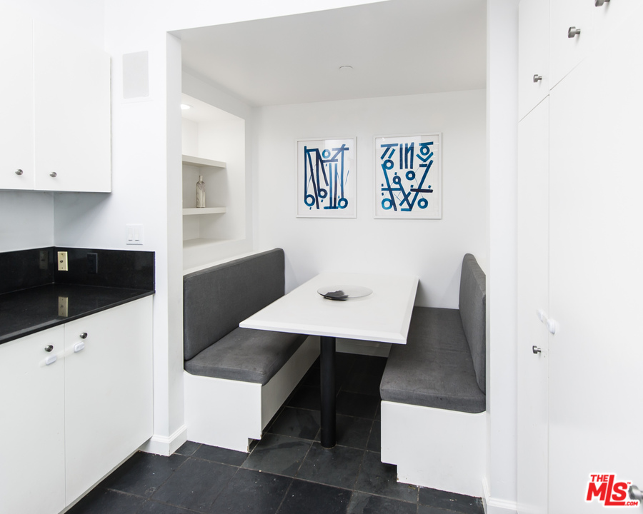 1908 North Beverly Drive Beverly Hills, CA 90210 - Photo 13 of 32 a living room with stainless steel appliances kitchen island a white counter top oven