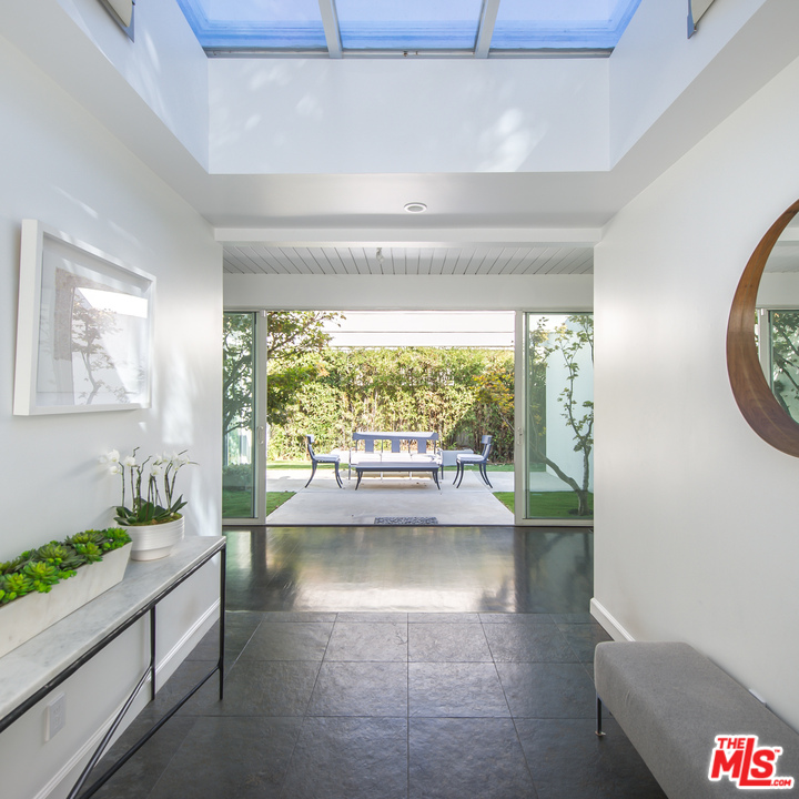 1908 North Beverly Drive Beverly Hills, CA 90210 - Photo 2 of 32 a view of room with window and furniture