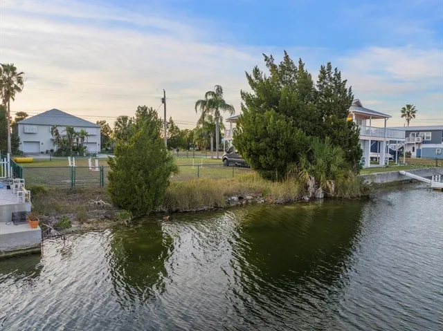 a view of a lake with houses