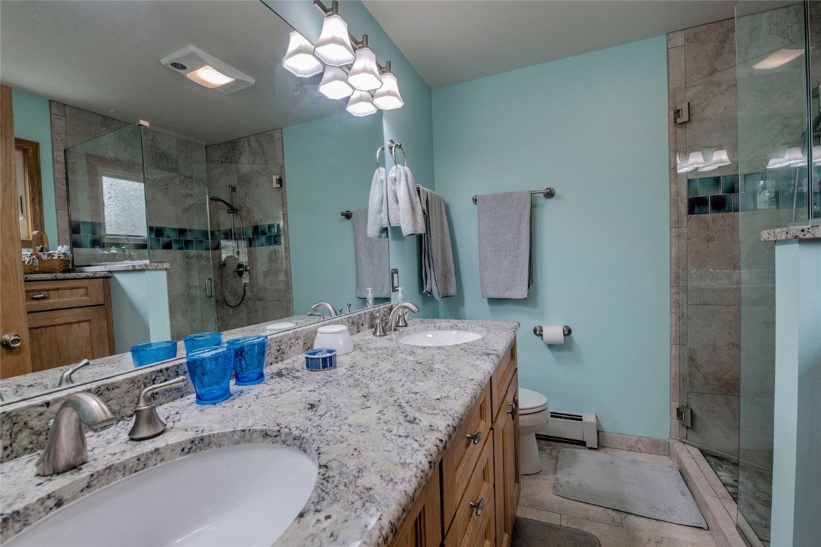 43 Lacy Drive Silverthorne, CO 80498 - Photo 14 of 35 a bathroom with double vanity and a sink