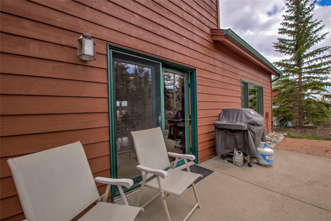 43 Lacy Drive Silverthorne, CO 80498 - Photo 17 of 35 a view of a patio with table and chairs and ice snow