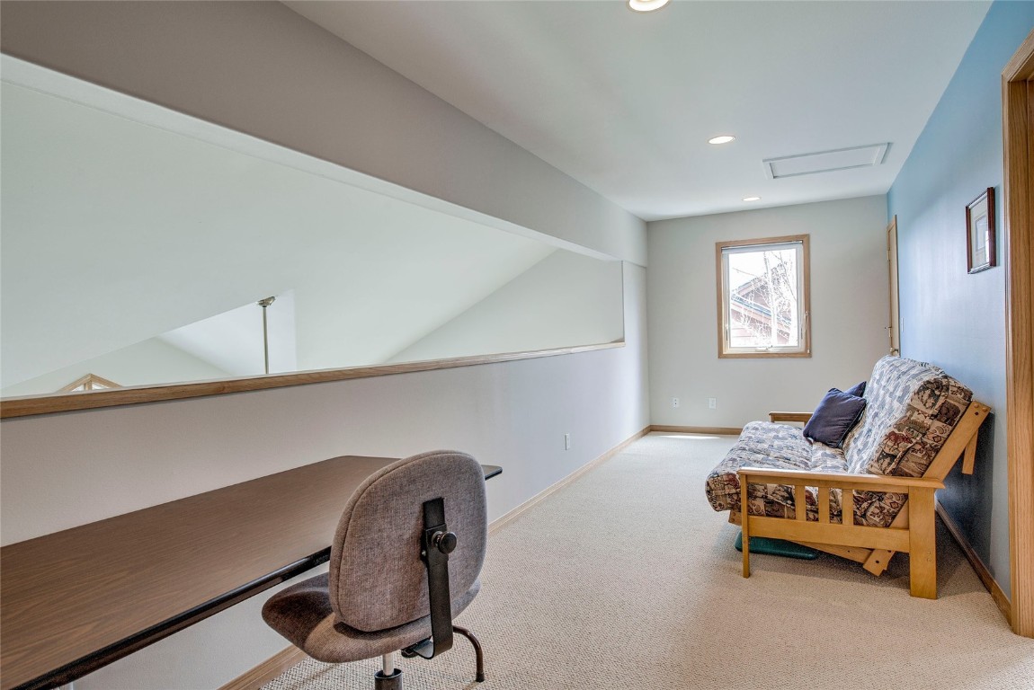 43 Lacy Drive Silverthorne, CO 80498 - Photo 20 of 35 a living room with furniture and a window