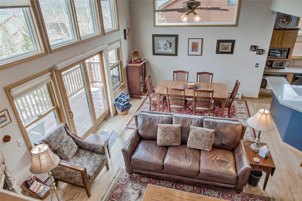 43 Lacy Drive Silverthorne, CO 80498 - Photo 3 of 35 a living room with furniture and a flat screen tv