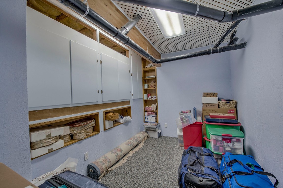 43 Lacy Drive Silverthorne, CO 80498 - Photo 31 of 35 a room with toys and dresser