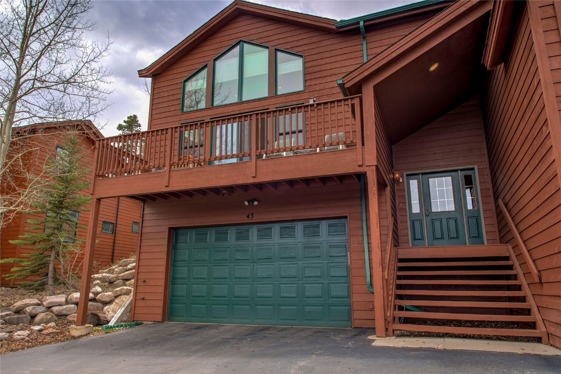 43 Lacy Drive Silverthorne, CO 80498 - Photo 33 of 35 a front view of a house with a garage
