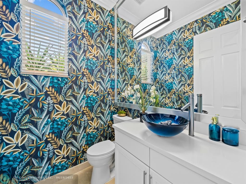 10741 Pine Lodge Trail Davie, FL 33328 - Photo 13 of 48 a bathroom with a toilet and a shower curtain