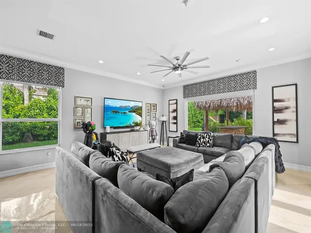 a kitchen with stainless steel appliances a stove sink and cabinets