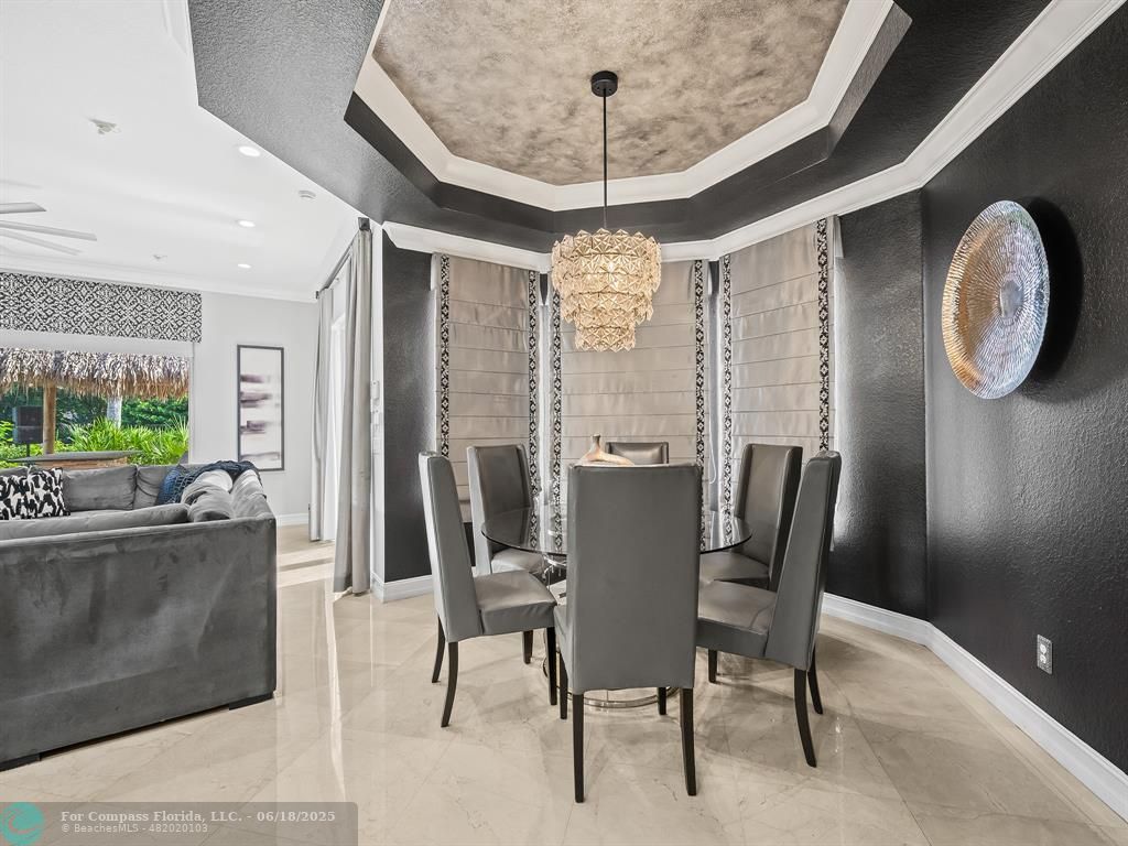 10741 Pine Lodge Trail Davie, FL 33328 - Photo 16 of 48 a view of a dining room with furniture window and outside view