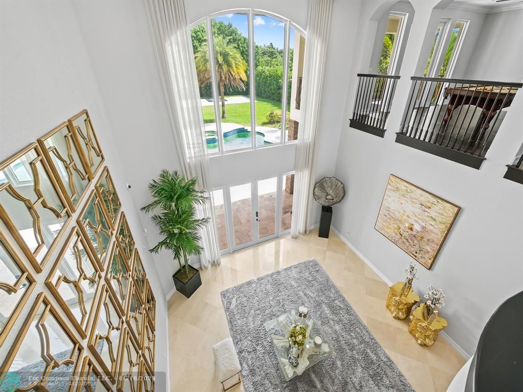 10741 Pine Lodge Trail Davie, FL 33328 - Photo 25 of 48 a living room with furniture and a large window