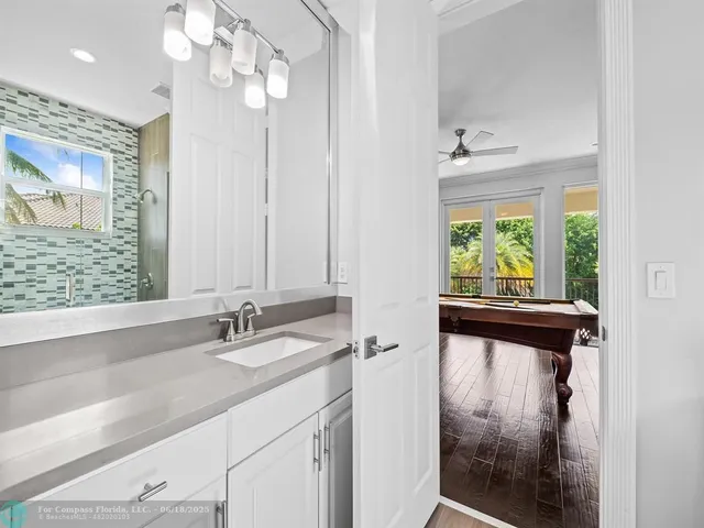 a bathroom with a shower and a toilet