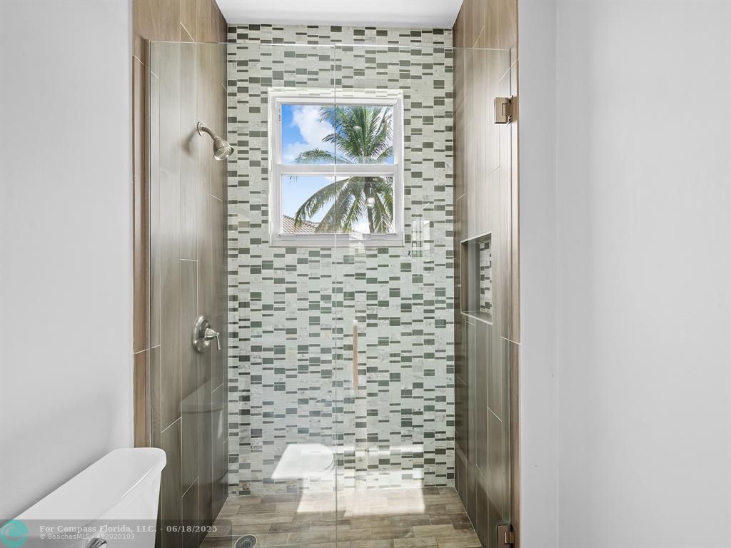 10741 Pine Lodge Trail Davie, FL 33328 - Photo 31 of 48 a bathroom with a shower and a toilet