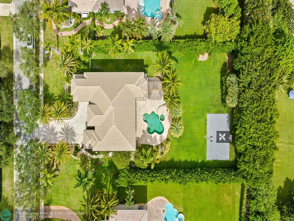 10741 Pine Lodge Trail Davie, FL 33328 - Photo 43 of 48 an aerial view of a house with swimming pool and garden space