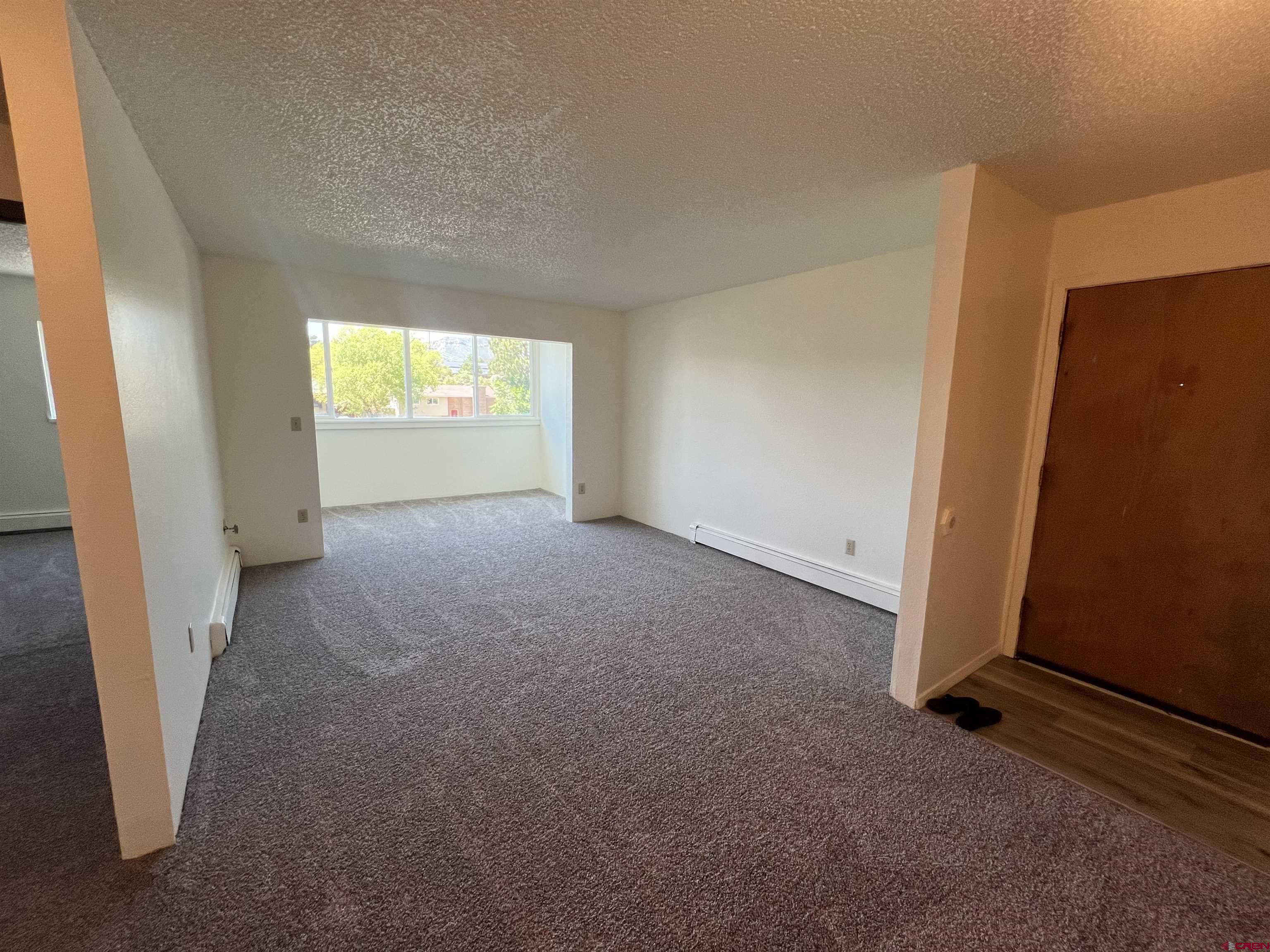 1135 Florida Road Durango, CO 81301 - Photo 18 of 24 an empty room with windows