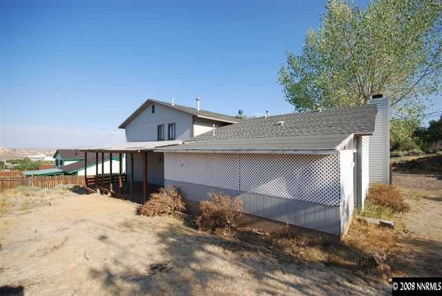 475 Hoge Road Reno, NV 89506 - Photo 9 of 9 a front view of a house with a yard