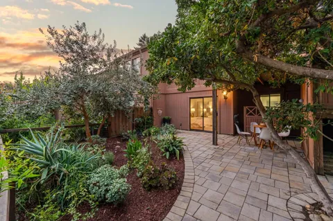 a view of deck with wooden floor and outdoor seating