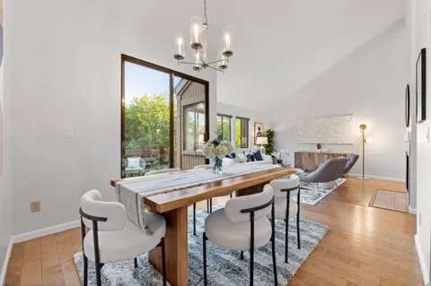 a kitchen with furniture a counter and appliances