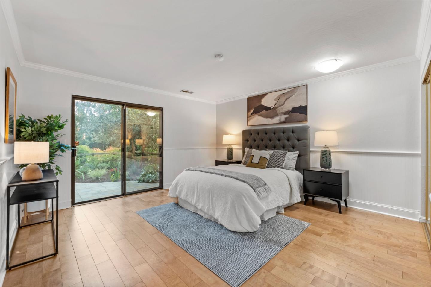 1631 Grant Road Mountain View, CA 94040 - Photo 31 of 51 a bedroom with a bed and a large window