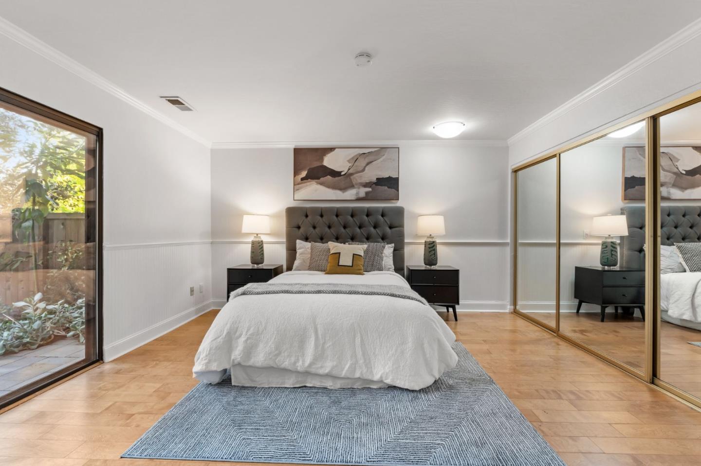 1631 Grant Road Mountain View, CA 94040 - Photo 32 of 51 a bedroom with a bed and a large window