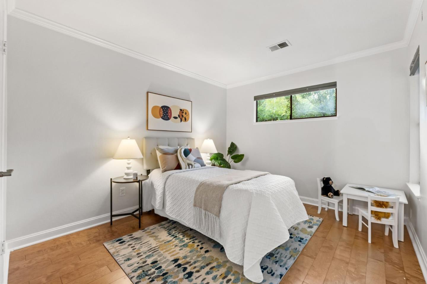 1631 Grant Road Mountain View, CA 94040 - Photo 34 of 51 a bedroom with a bed and a desk