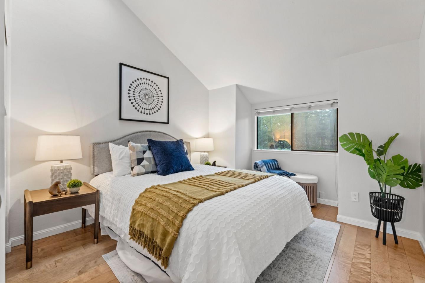 1631 Grant Road Mountain View, CA 94040 - Photo 35 of 51 a bedroom with bed and a potted plant