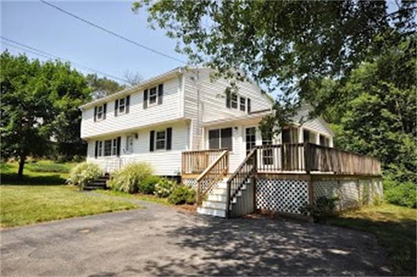 20 Grandview Road Billerica, MA 01821 - Photo 5 of 26 a front view of a house with a garden