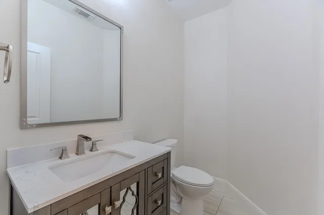 a bathroom with a sink and a toilet