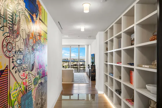 a living room with fireplace furniture and a flat screen tv