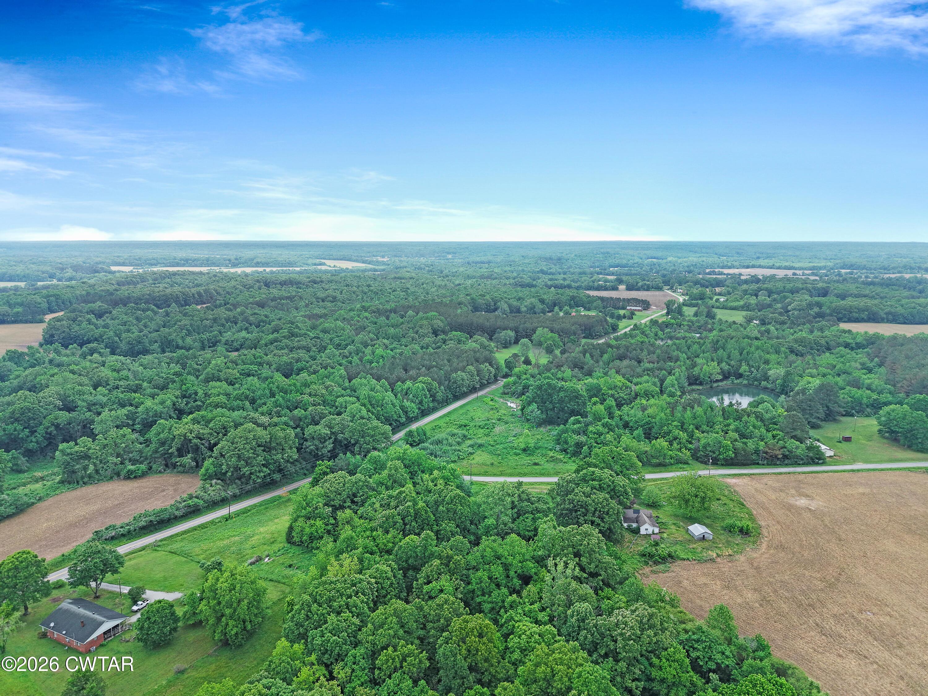 1525 Mill Creek Road Cedar Grove, TN 38321 - Photo 9 of 15 a view of a field with an ocean view