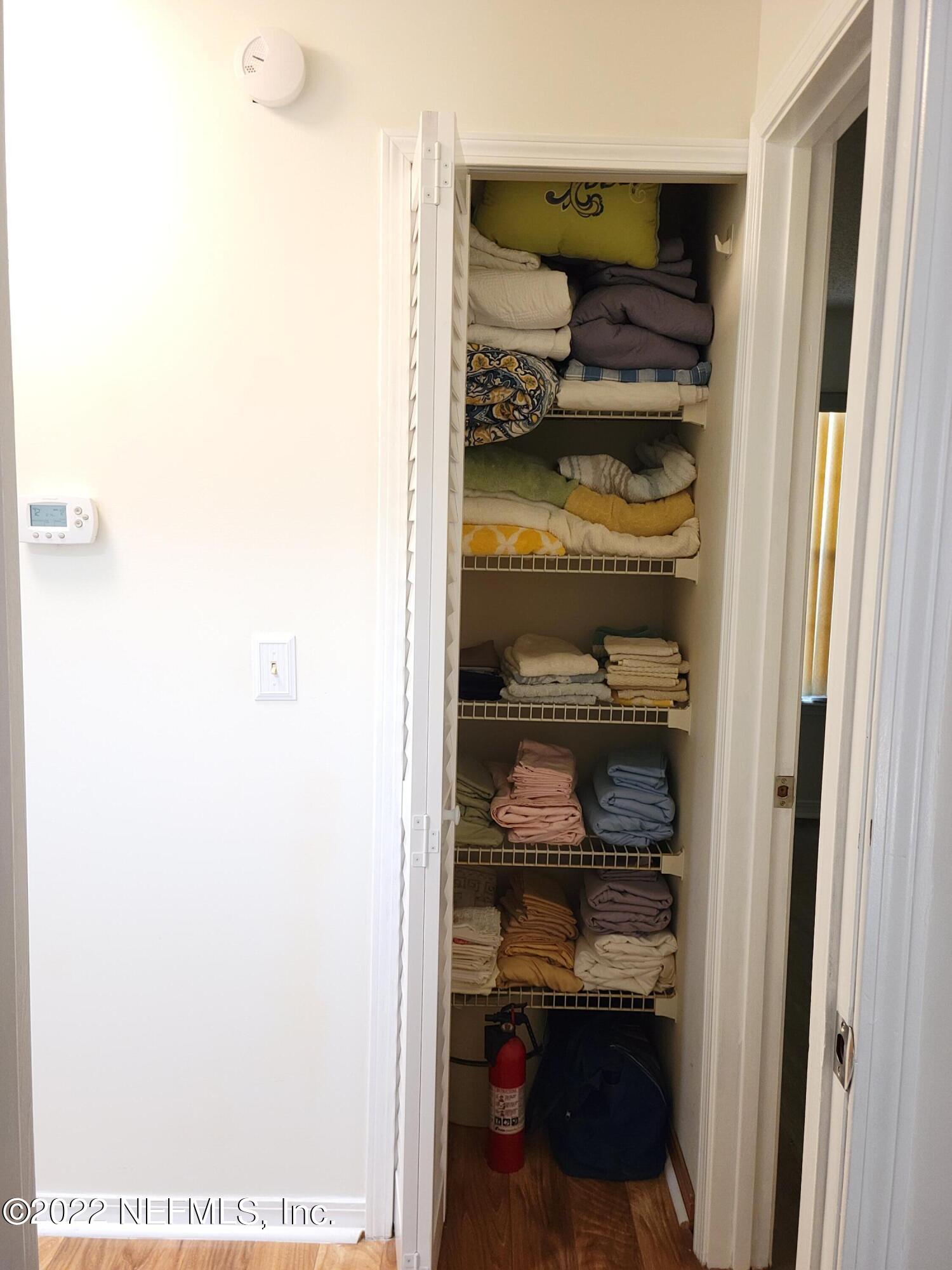 5425 Spring Brook Road Jacksonville, FL 32277 - Photo 15 of 35 a view of a walk in closet