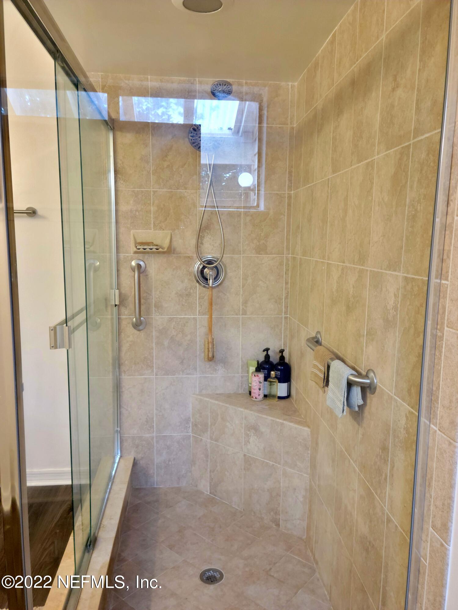 5425 Spring Brook Road Jacksonville, FL 32277 - Photo 23 of 35 a bathroom with a shower